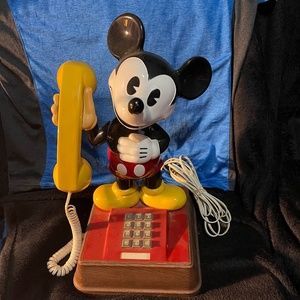 Let Mickey Mouse hold your phone handset